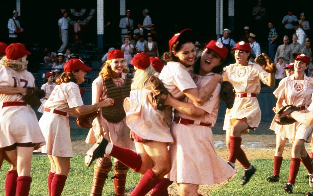 The women baseball team from the movie A League Of Their Own celebrating on Wrigley Field