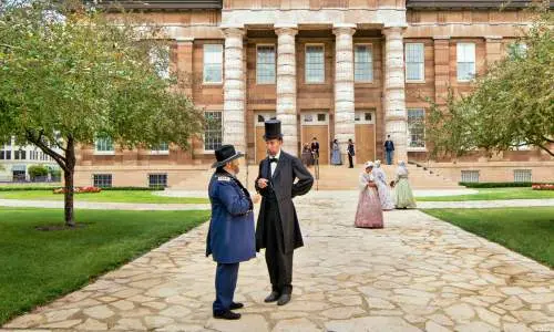 Lincoln in front of large building