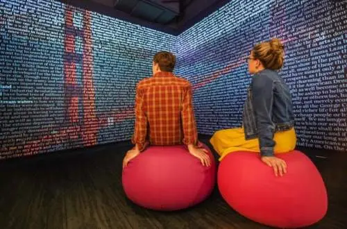 People staring at a wall of words