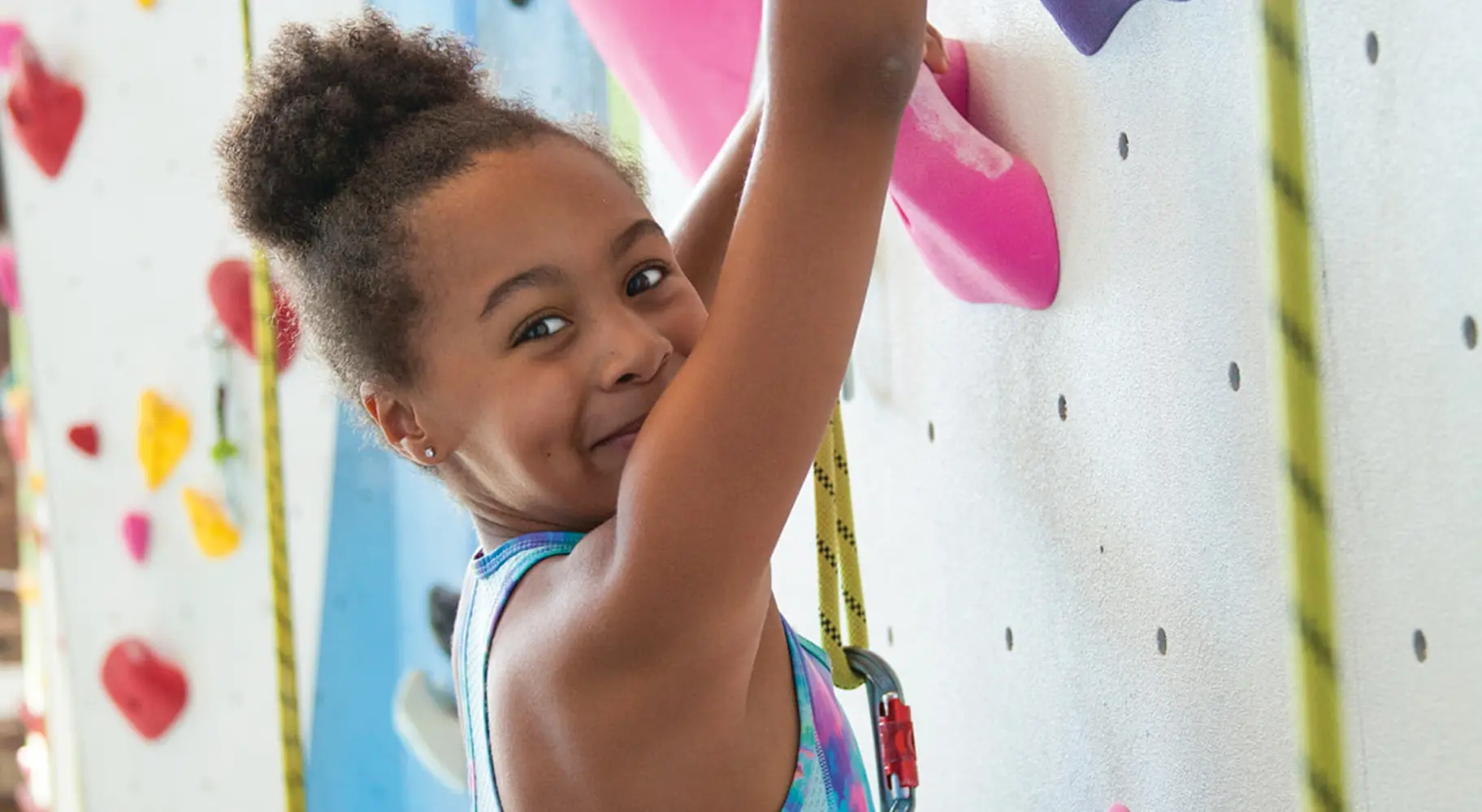 Kid rock climbing
