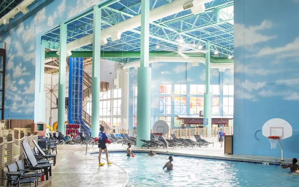 Lifeguard observing swimmers in the indoor pool