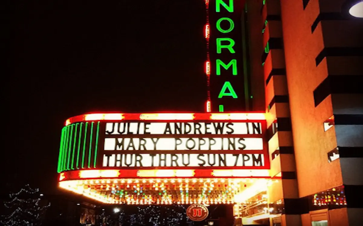 The exterior of Normal Theaters with lights