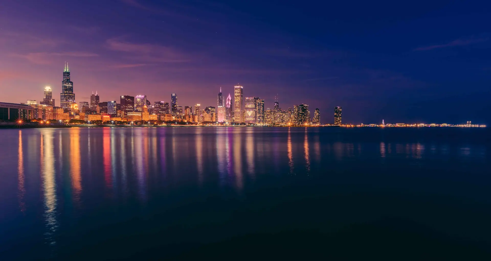 View of the lake and Chicago skyline at night