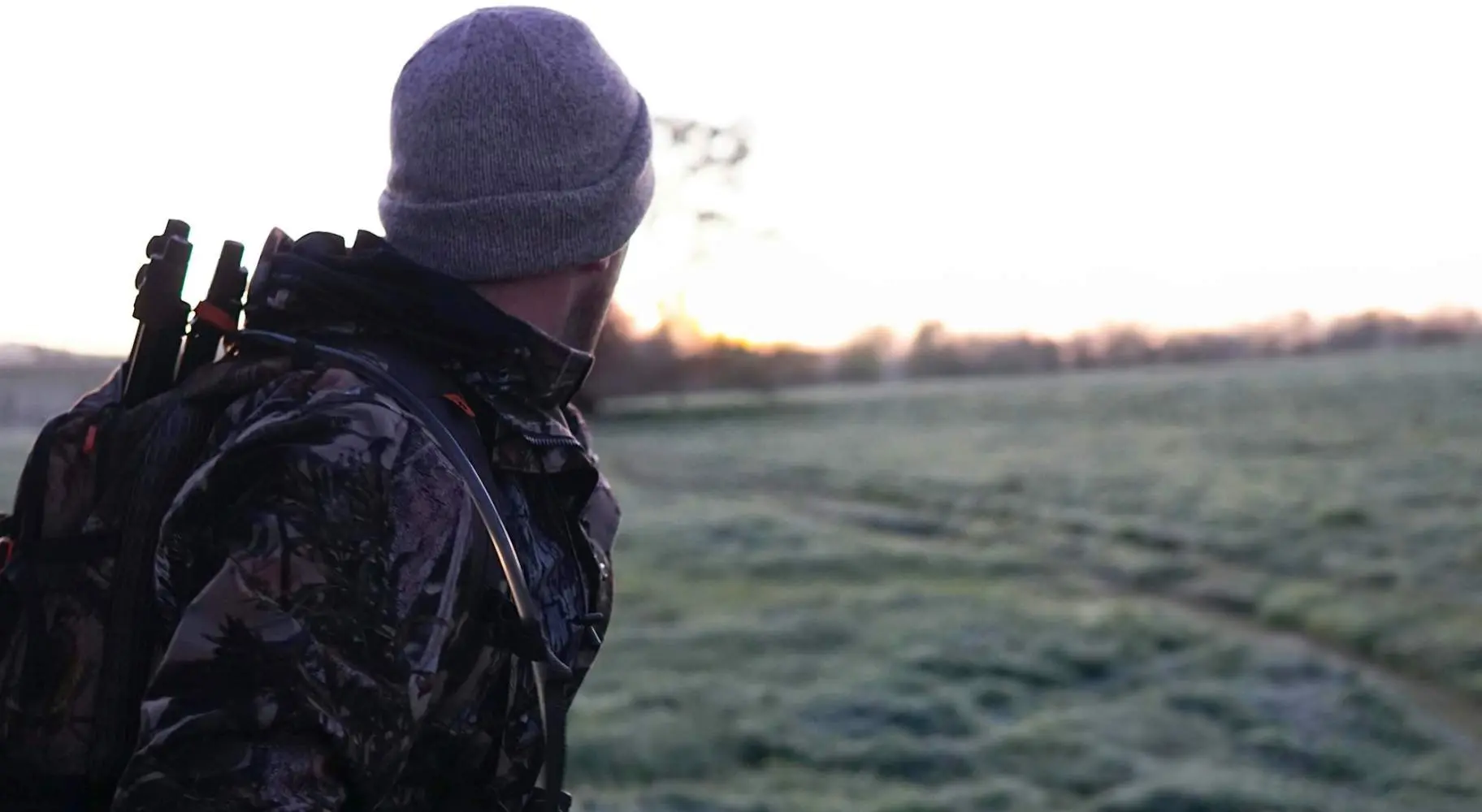 A hunter looks out to the horizon