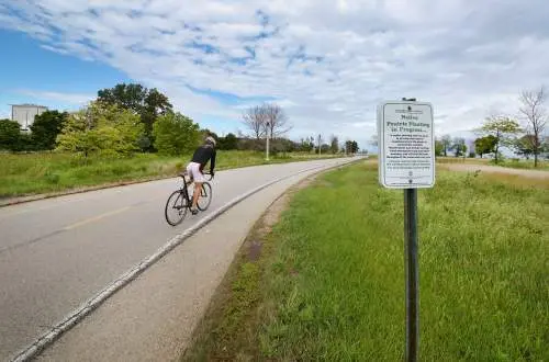 Man biking down road