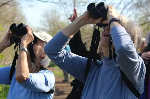 Two women with binoculars