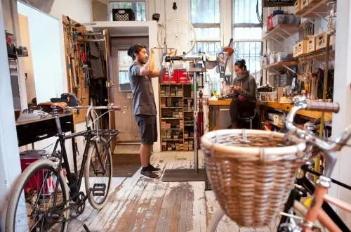 Crew fixing bikes at the Heritage Bicycles.