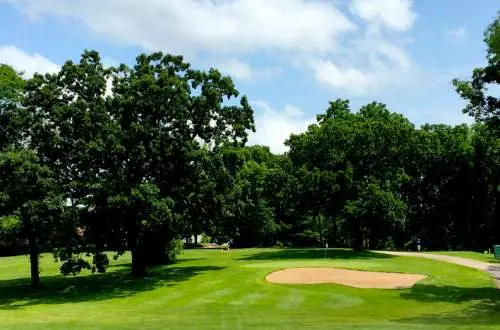 A golf course on a sunny day.