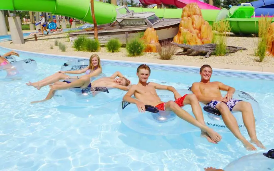Teenagers on inflatable tubes in a lazy river