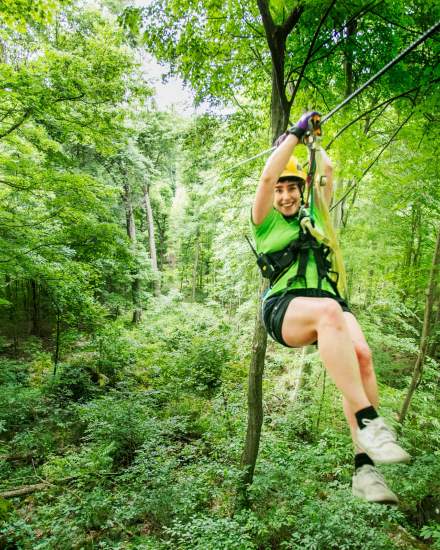 A woman on a zipline in Shawnee National Forest