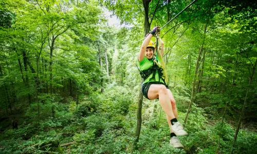 A woman on a zipline in Shawnee National Forest