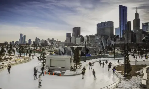 People ice skating in a park in Chicago