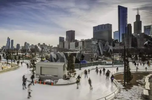People ice skating in a park in Chicago