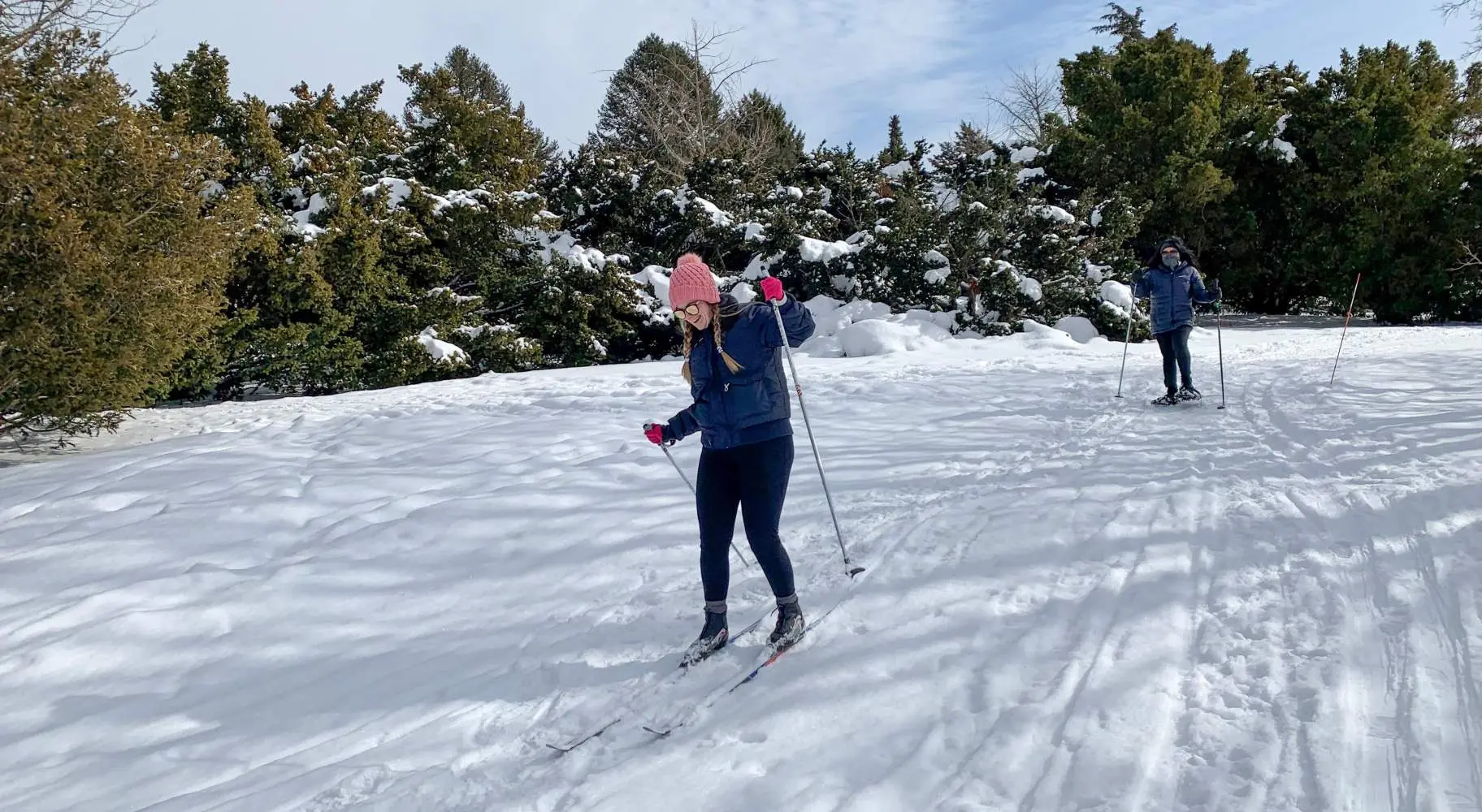 Two people skiing