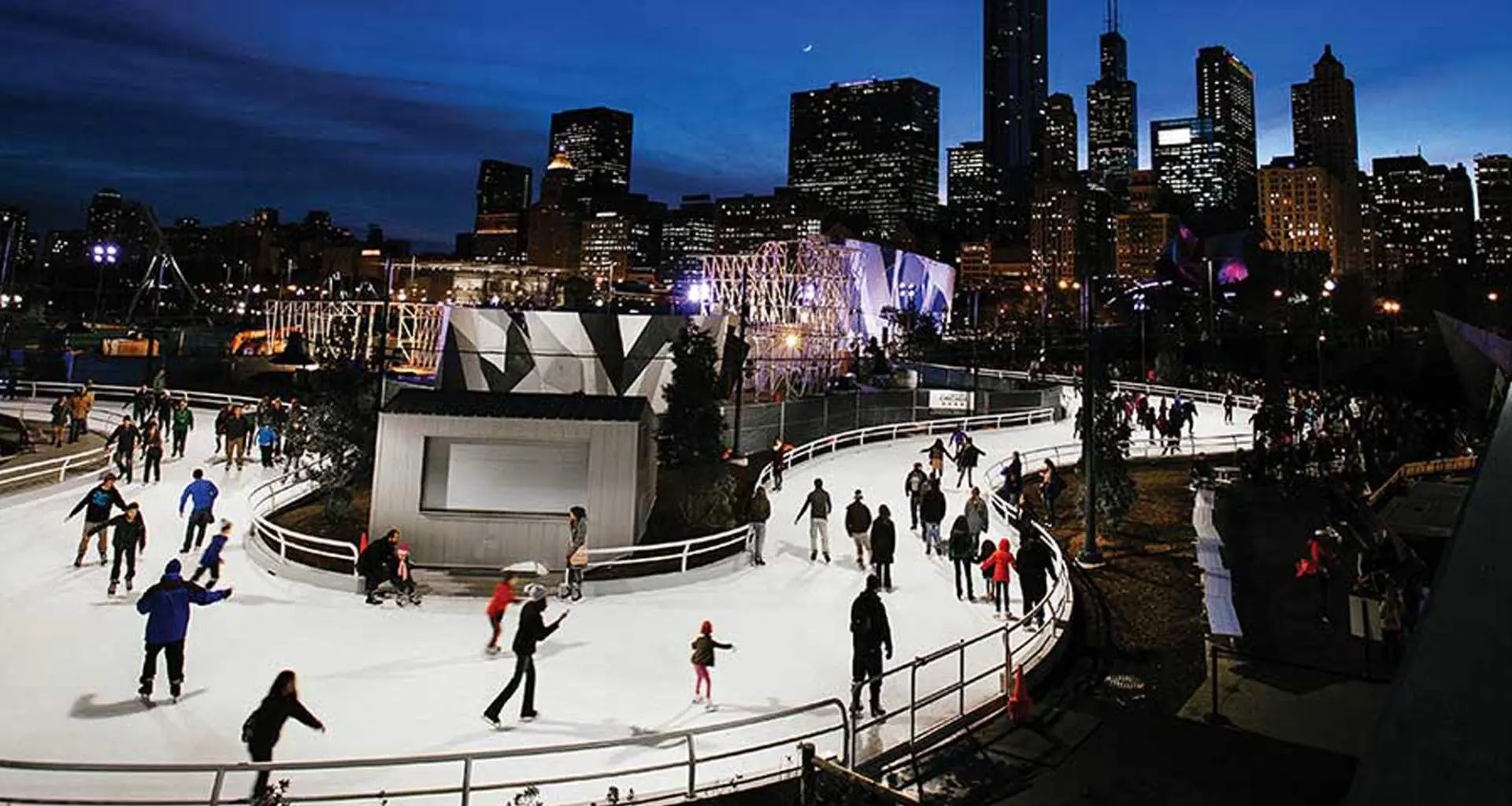 People skating down the ribbon