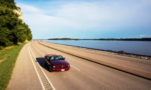 Cars driving on the Great River Road.