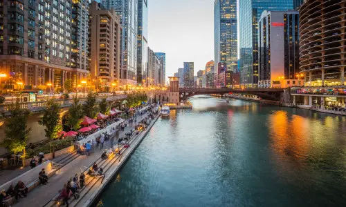A city with big buildings and a river running through it