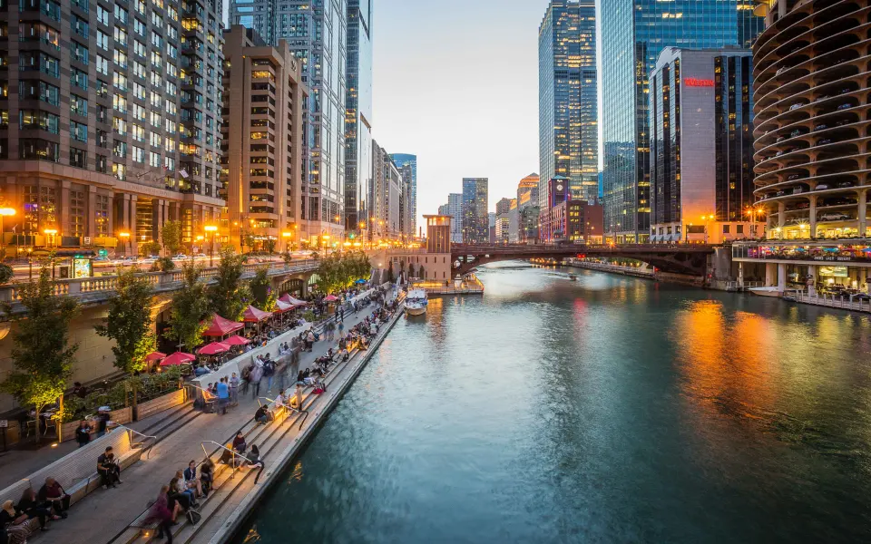 A city with big buildings and a river running through it