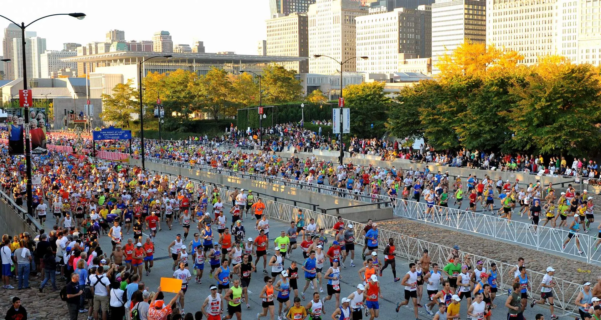 Lots of runners running along the street